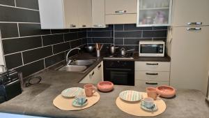 ボーザにあるHouse with Dream Panoramic Terrace in the Heart of Bosa, 80 sqm with BBQ and Breathtaking Viewのギャラリーの写真