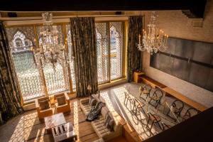 an overhead view of a room with chairs and windows at The Venice Venice Hotel in Venice