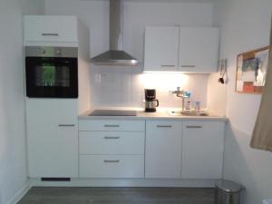 Kuchyň nebo kuchyňský kout v ubytování Ferienwohnung Niemann in Lutterloh + 9 fotografií