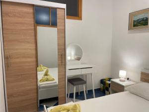 Posteľ alebo postele v izbe v ubytovaní Apartments Molo Mare