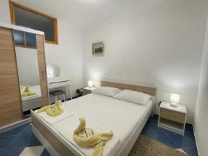 Posteľ alebo postele v izbe v ubytovaní Apartments Molo Mare