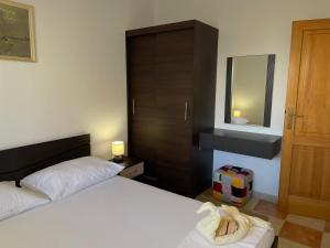 Posteľ alebo postele v izbe v ubytovaní Apartments Molo Mare