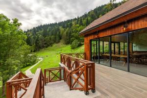 a house with a deck with a view at Sairme Hotels & Resorts in Sairme
