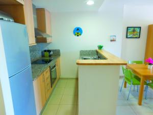 Kuchyňa alebo kuchynka v ubytovaní GMID IMMO Apartment Mileni