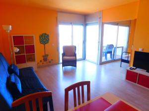 Televízia a/alebo spoločenská miestnosť v ubytovaní GMID IMMO A222 Gregal Piso 2 habitaciones, parking y piscina