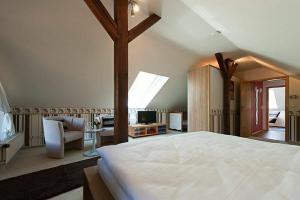 Un pat sau paturi într-o cameră la Ferienwohnung Erika Constabel