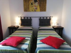 A bed or beds in a room at Sacripante