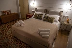 Tempat tidur dalam kamar di Appartamento Natinguerra