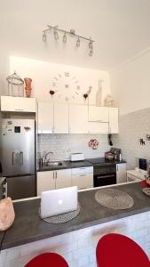 A kitchen or kitchenette at Suite Poseidon Golf & Ocean View