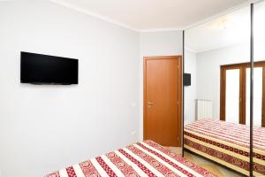 Postel nebo postele na pokoji v ubytování Raggio di Sole by BarbarHouse