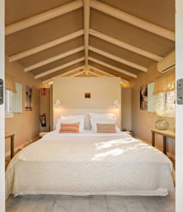 Postel nebo postele na pokoji v ubytování Finca Naranja