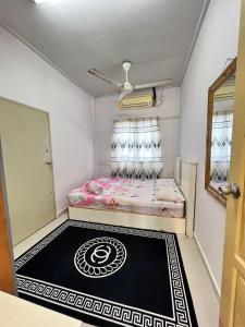 Ένα ή περισσότερα κρεβάτια σε δωμάτιο στο UMINA INN