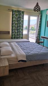 Postel nebo postele na pokoji v ubytování Boutique Pelayo