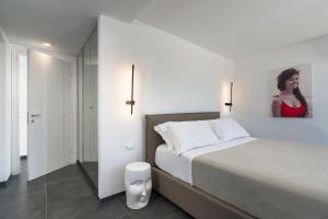Letto o letti in una camera di La Dolce Vita