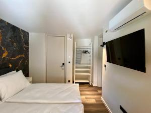 Postel nebo postele na pokoji v ubytování Boutique hotel ZBILJE