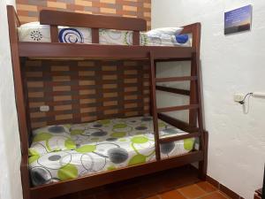 Bunk bed o mga bunk bed sa kuwarto sa Hospedaje Campestre Villa Niny