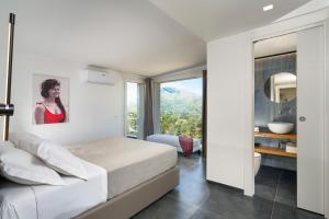 Letto o letti in una camera di La Dolce Vita