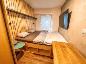 Postel nebo postele na pokoji v ubytování Vantisch Apartment