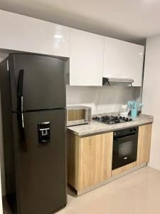 Кухня или мини-кухня в Apartamento de tres alcobas
