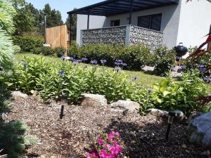 Vonkajšia záhrada v ubytovaní Apartment Moravský Kras