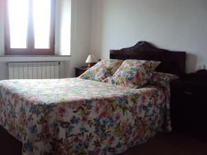 Postel nebo postele na pokoji v ubytování Casa de Lucas