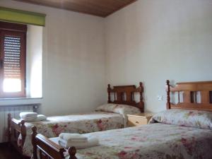 Postel nebo postele na pokoji v ubytování Casa de Lucas