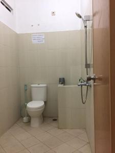 Koupelna v ubytování Garser Taman Sari