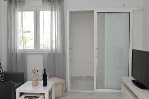 TV a/nebo společenská místnost v ubytování Golden Neretva apartments