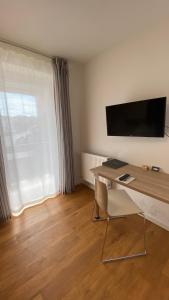 TV a/nebo společenská místnost v ubytování Pension Rathaus