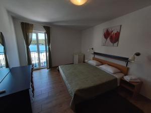 Postel nebo postele na pokoji v ubytování Sobe MaMaLu
