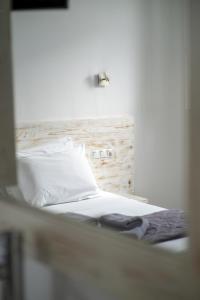 Posteľ alebo postele v izbe v ubytovaní Porto Naoussa