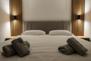 Katil atau katil-katil dalam bilik di RITUAL Apartment - 20m from the sea