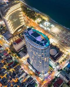 an overhead view of a large building at night at Panorama Apartment Nha Trang in Nha Trang