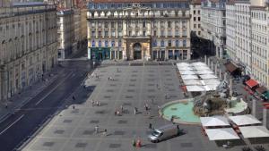 a large plaza in front of a large building at Beautiful 3BR Apt in Lyon Center in Lyon