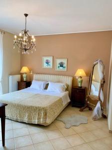 Łóżko lub łóżka w pokoju w obiekcie Villa Zose' luz
