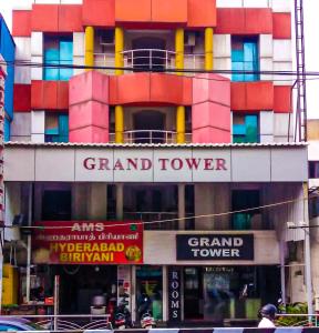 a large building with a grand tower on top of it at Grand tower Chennai in Chennai