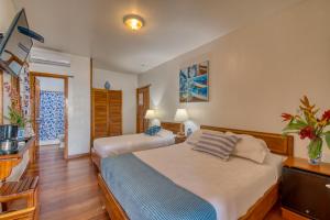 Ein Bett oder Betten in einem Zimmer der Unterkunft Hotel Bocas del Toro