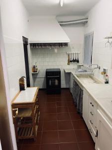 Kuchyňa alebo kuchynka v ubytovaní Casa iaia