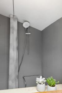 a shower in the corner of a bathroom at Casa Porto Conero in Porto Recanati