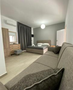 Postel nebo postele na pokoji v ubytování Villa Loukas