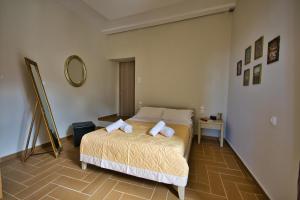 Postel nebo postele na pokoji v ubytování West Crete House