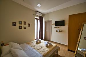 TV a/nebo společenská místnost v ubytování West Crete House