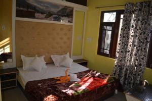 Letto o letti in una camera di Nice One Palace