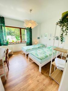 Postel nebo postele na pokoji v ubytování Eifel-House - FeWo