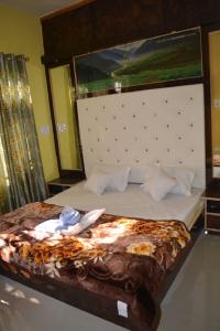 Letto o letti in una camera di Nice One Palace
