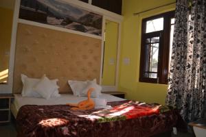 Letto o letti in una camera di Nice One Palace