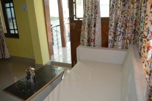 Letto o letti in una camera di Nice One Palace