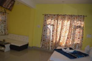 Letto o letti in una camera di Nice One Palace