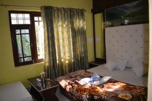 Letto o letti in una camera di Nice One Palace