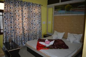 Letto o letti in una camera di Nice One Palace